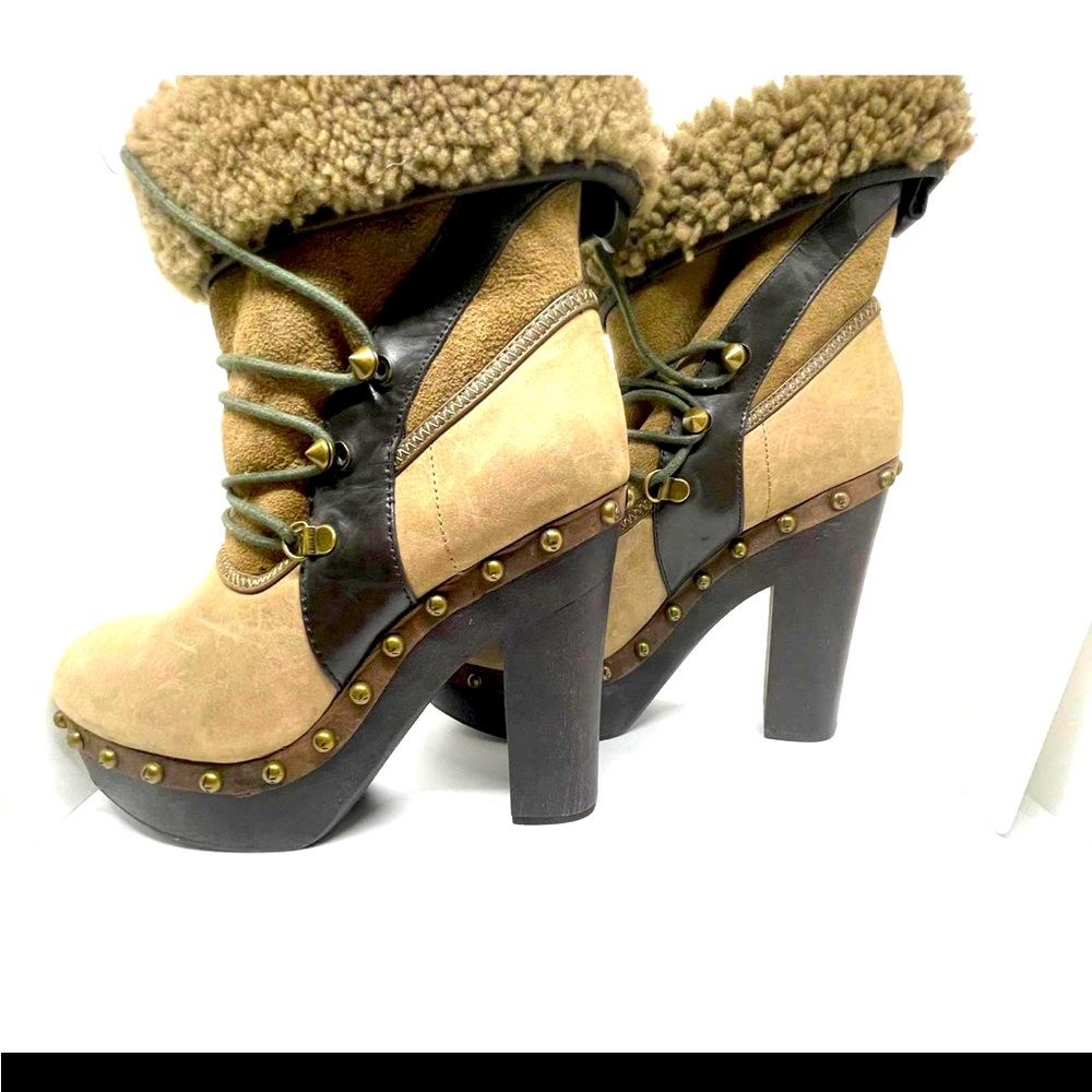 The newest member of UGG Koolburra womens siz 9 , platform high heel .